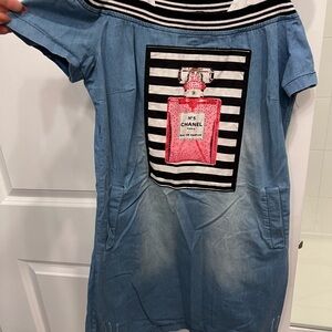 Blue Dress with Pink Perfume Bottle Design